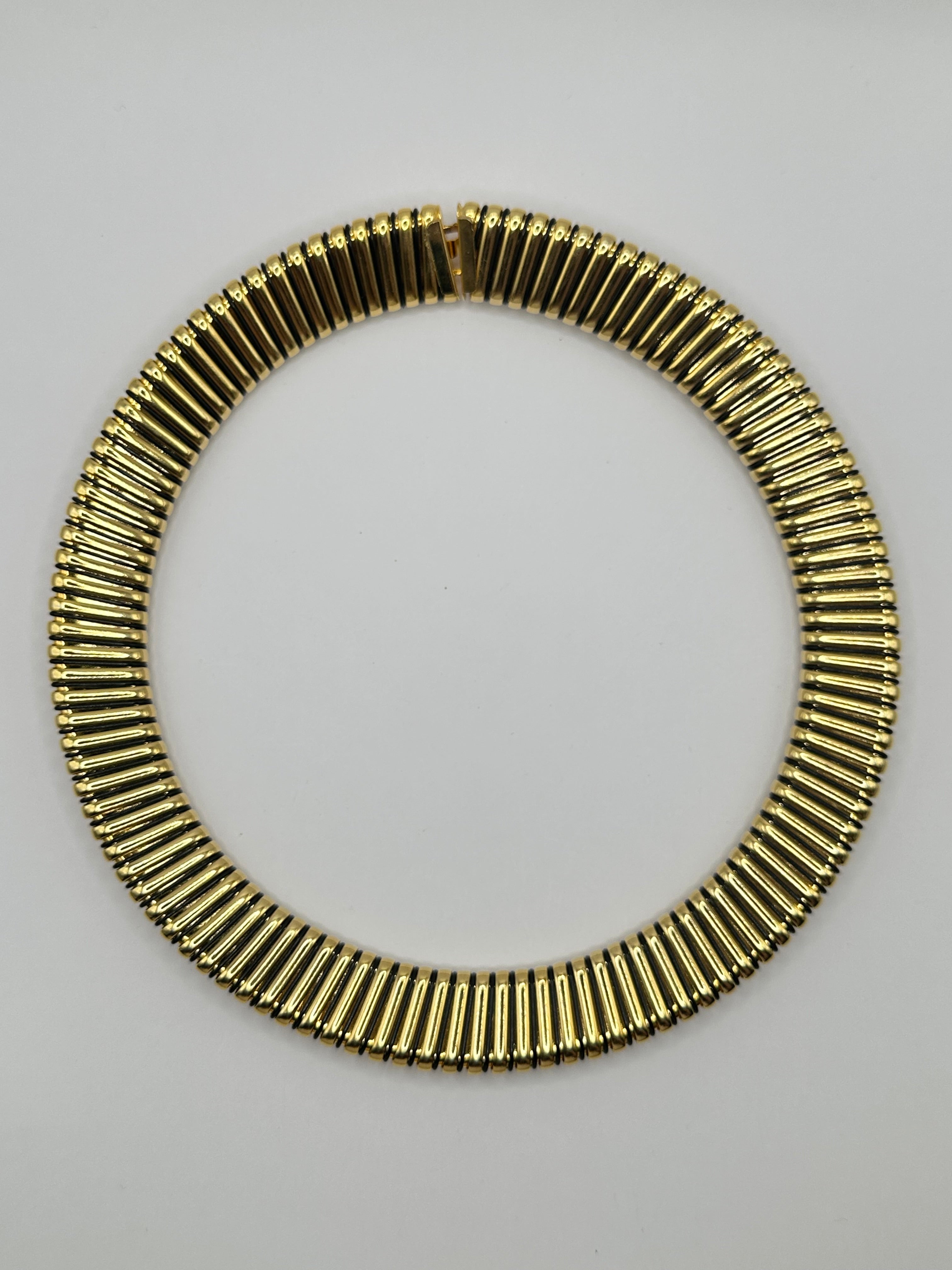 COLLIER VINTAGE DORATO E NERO TUBOGAS RIGIDO – GIROCOLLO STATEMENT