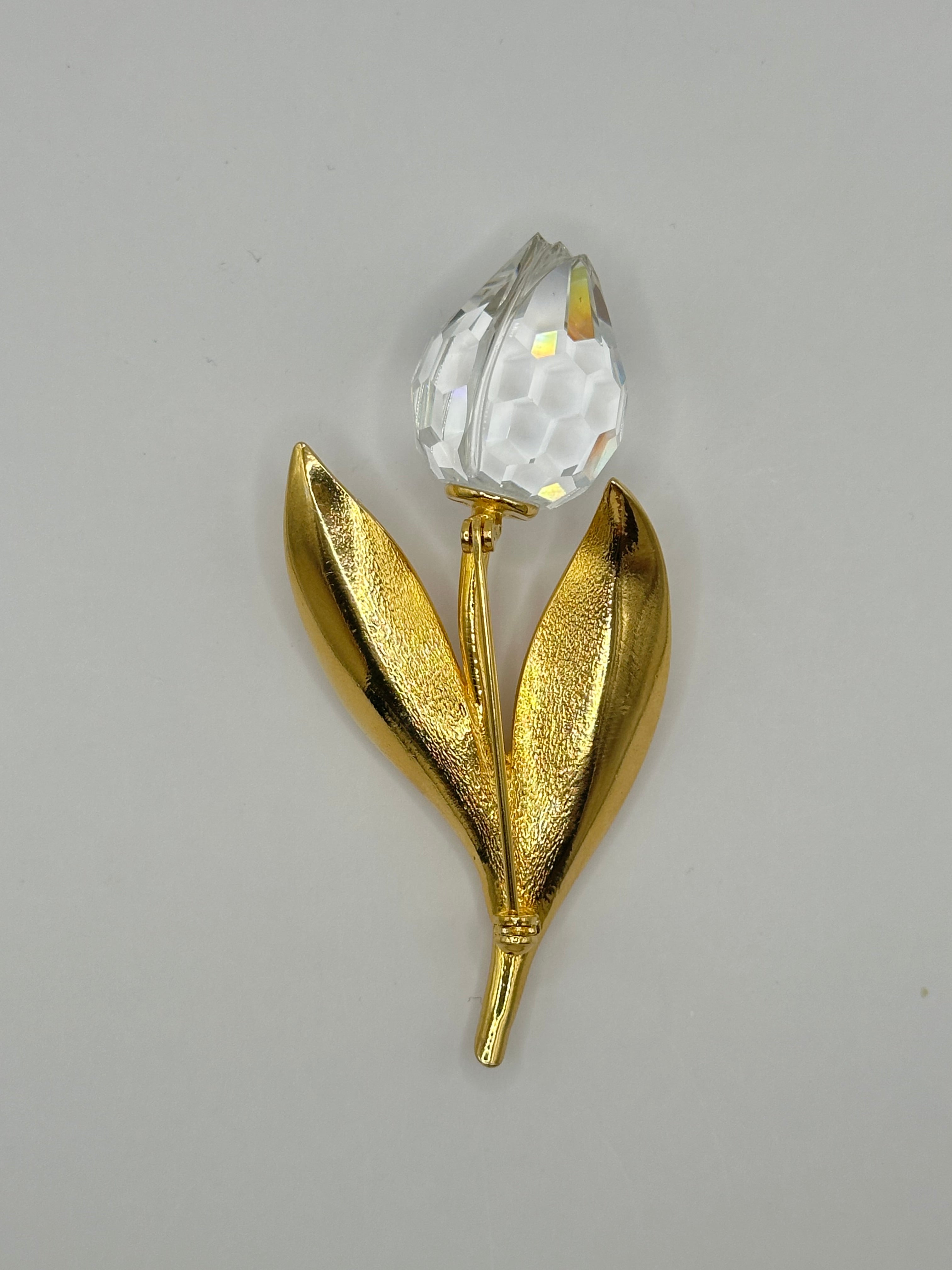 SPILLA VINTAGE SWAROVSKI CON FIORE STILIZZATO CRISTALLO SFACCETTATO E FOGLIE DORATE - ANNI ’80