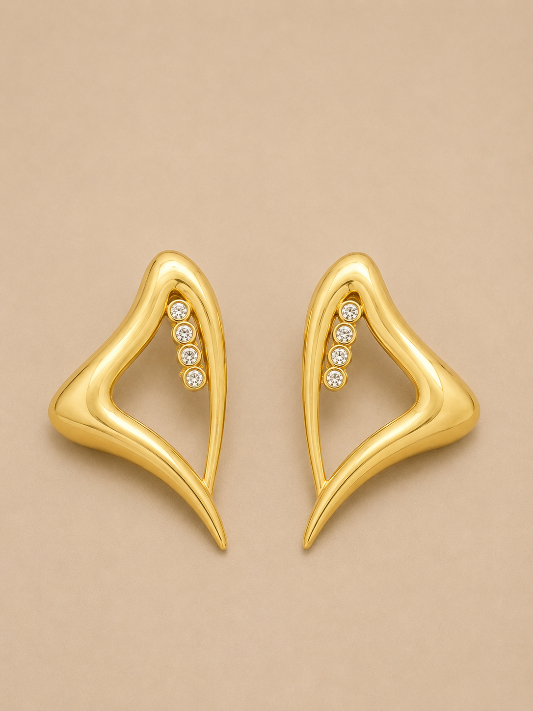 ORECCHINI VINTAGE A CLIP DORATI DAL DESIGN SCULTOREO E ASTRATTO CON STRASS - ANNI ’90